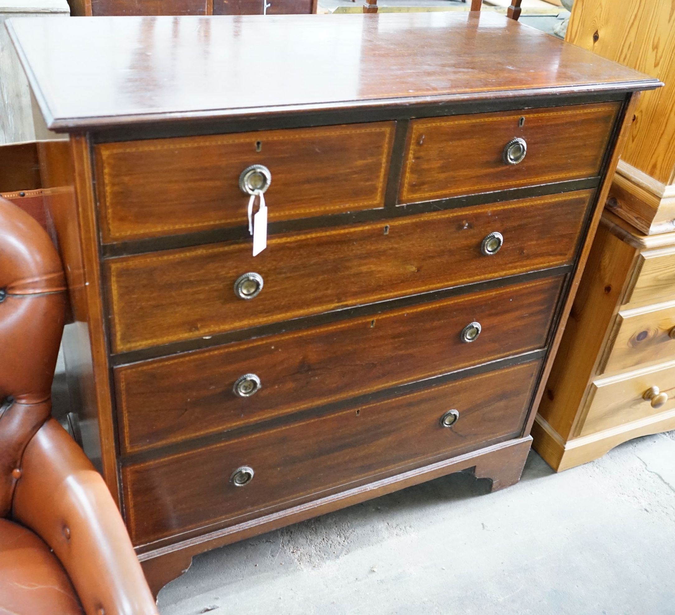 An Edwardian inlaid mahogany chest, fitted two short and three long drawers, width 106cm, depth 52cm, height 107cm
